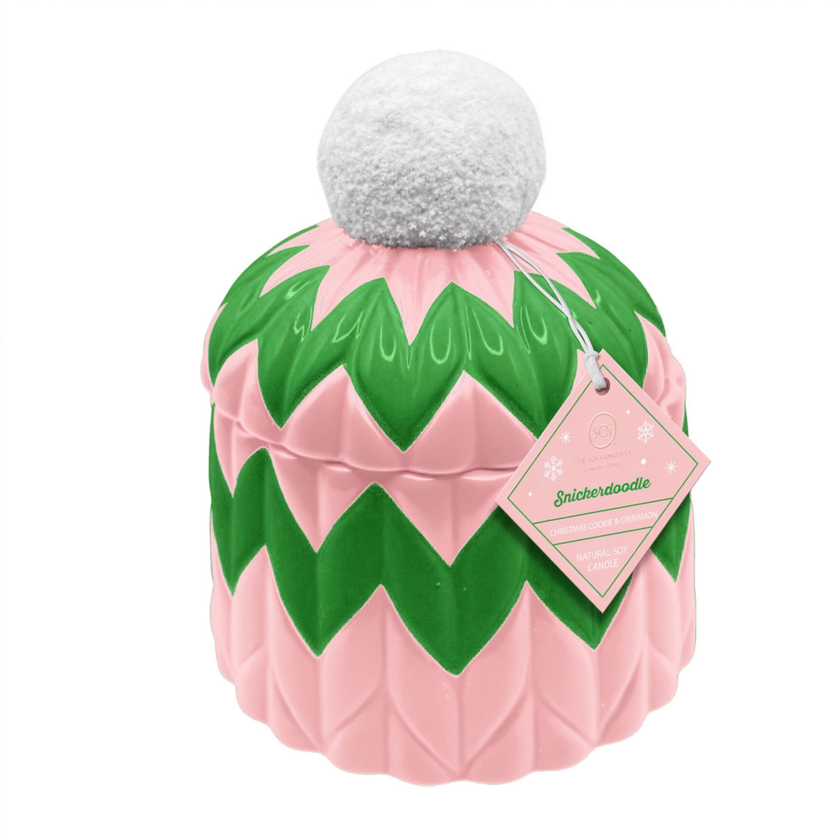A pink and green chevron-patterned ceramic jar with a white faux-fur pom-pom on top and a hanging paper tag, shown on a plain white background.