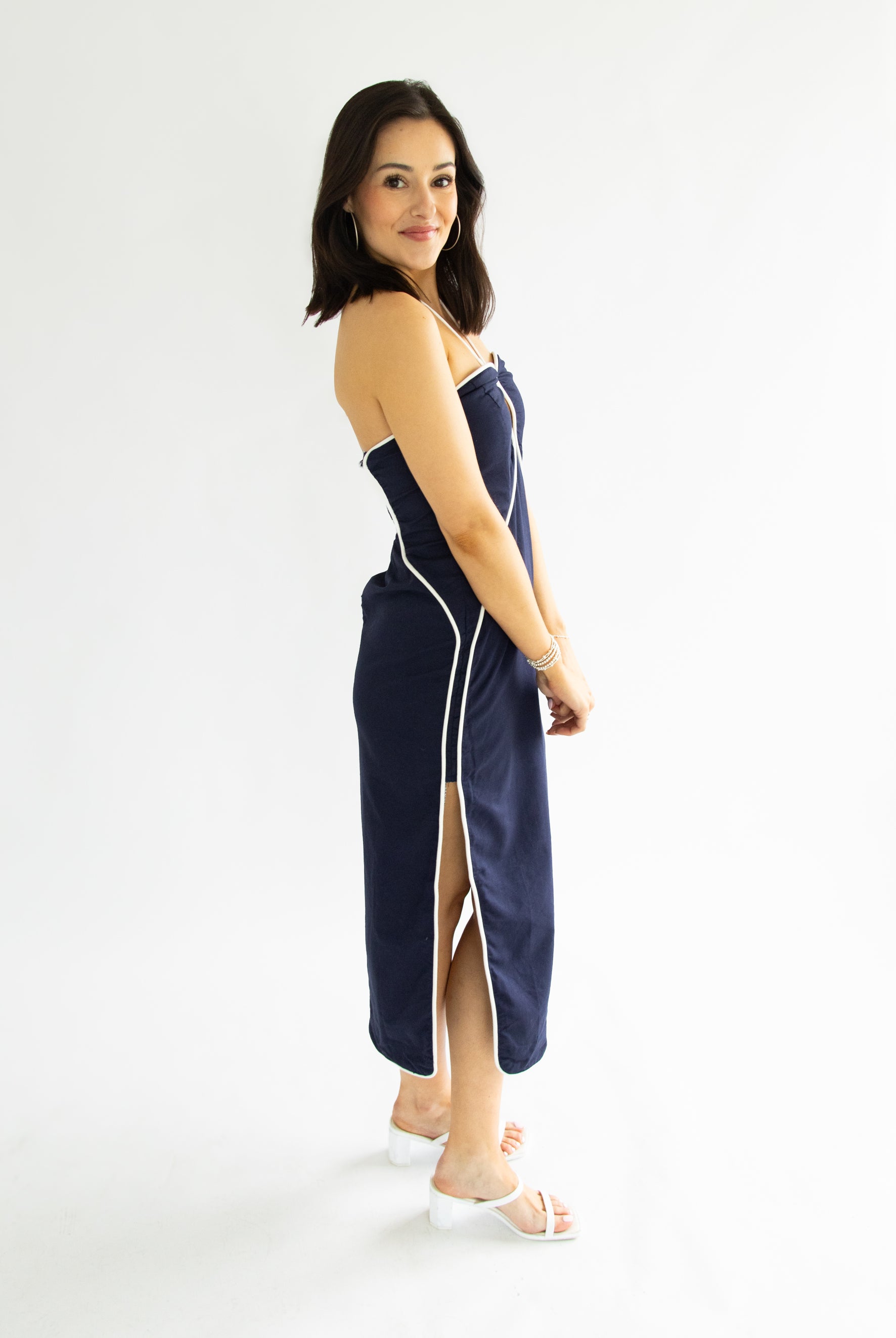 woman wearing navy dress
