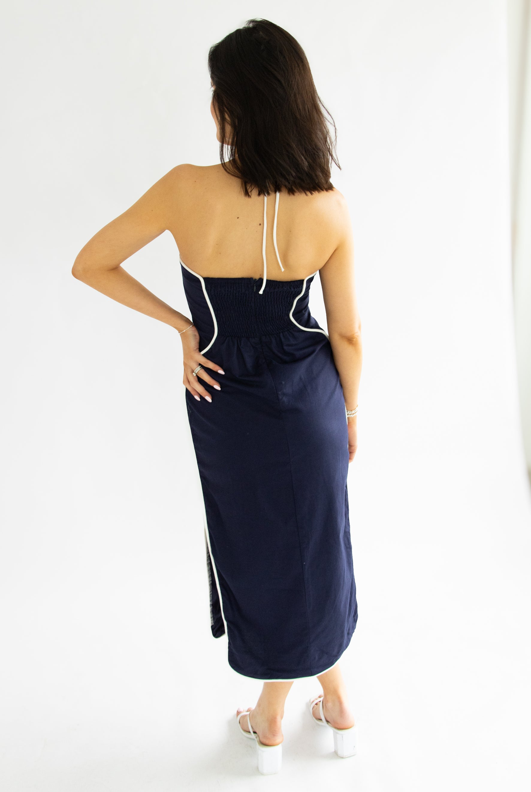 woman wearing navy dress