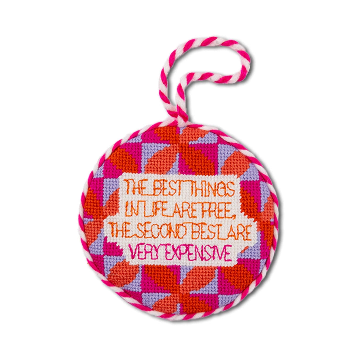 Round ornament with colorful pattern and text on a white background