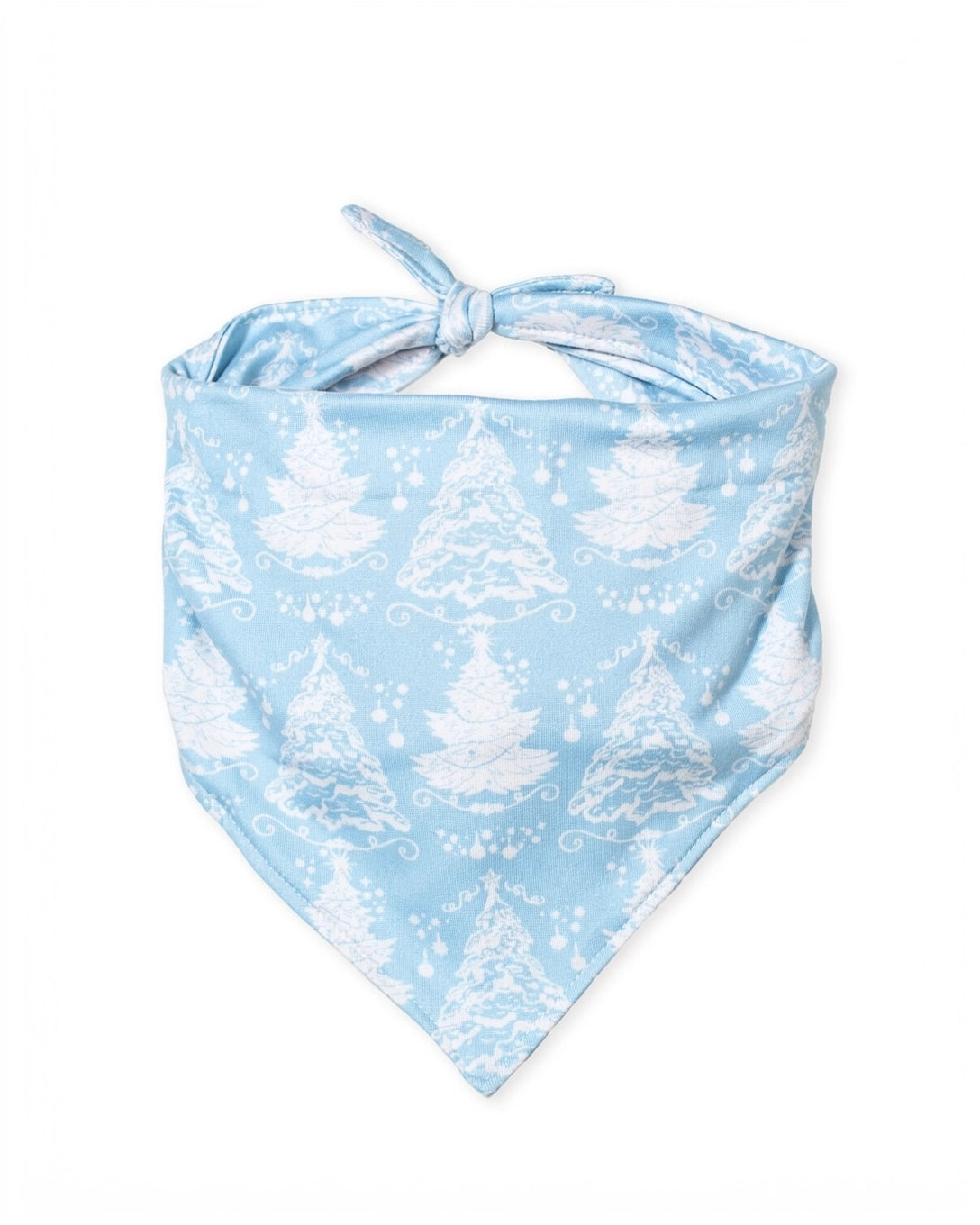 A light blue pet bandana with a white winter tree pattern, tied at the top and photographed on a solid white background.