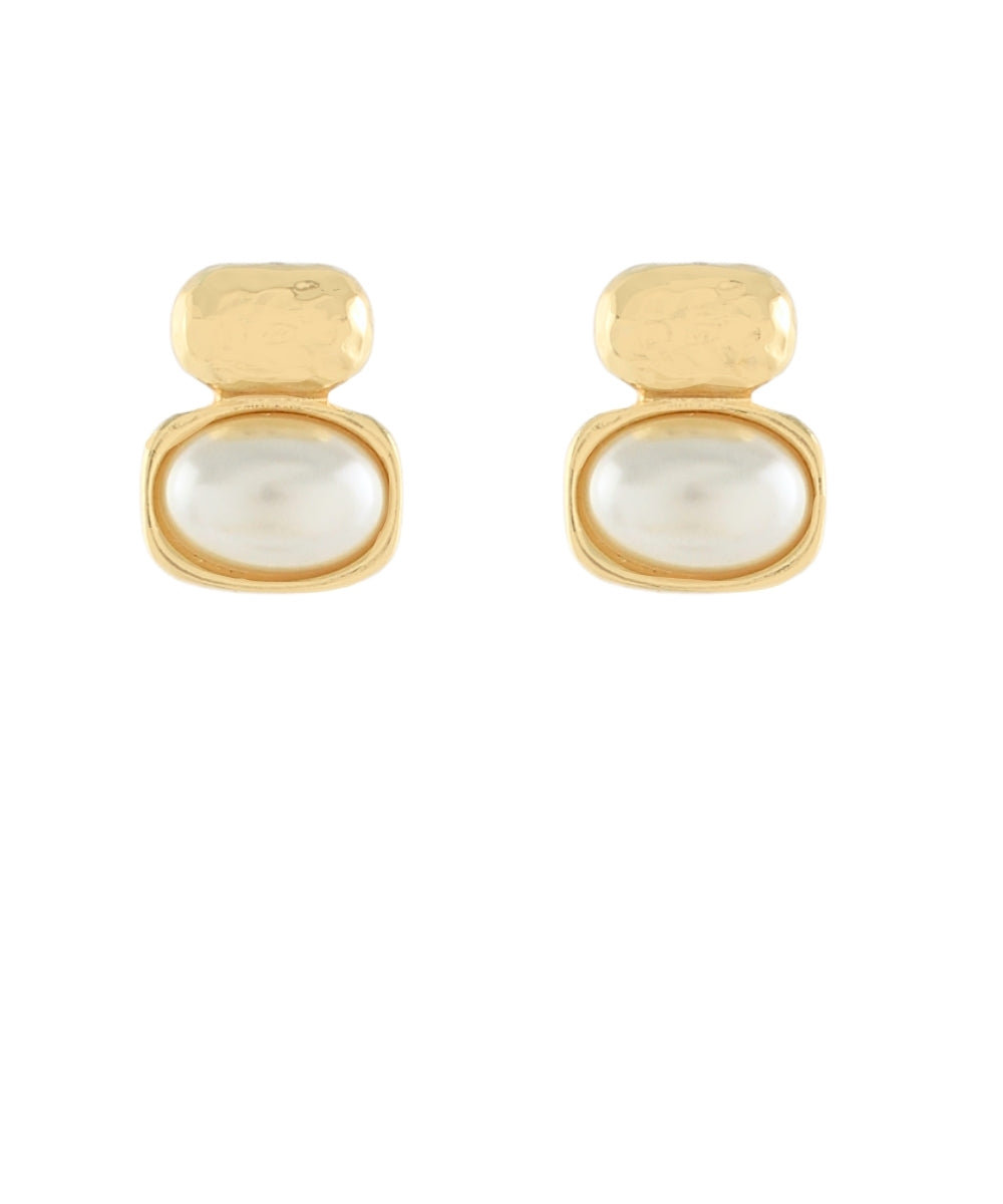A pair of gold stud earrings with a textured, rounded top and a smooth, oval white pearl drop below, set against a plain white background.
