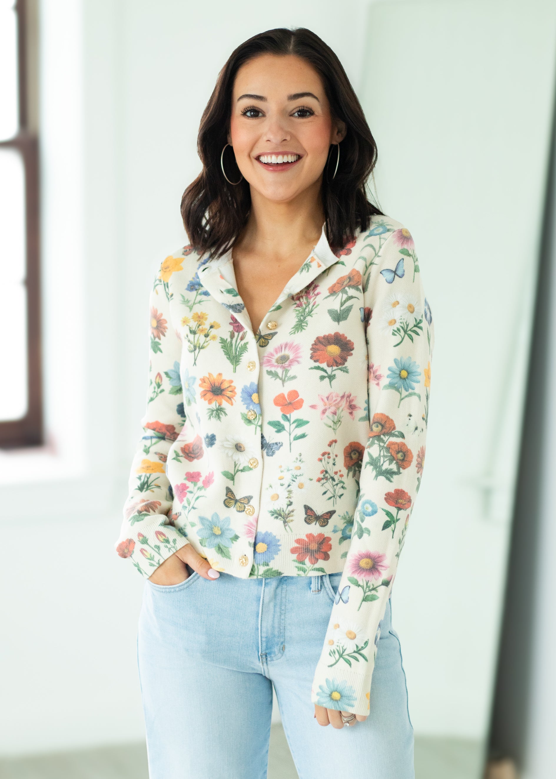 Woman wearing a floral blouse with a blurred background