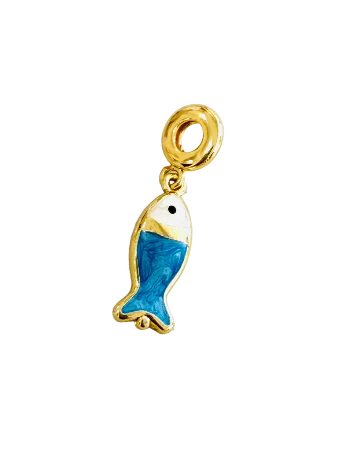 A small gold fish charm pendant with blue and white enamel detailing, shown on a light textured background.