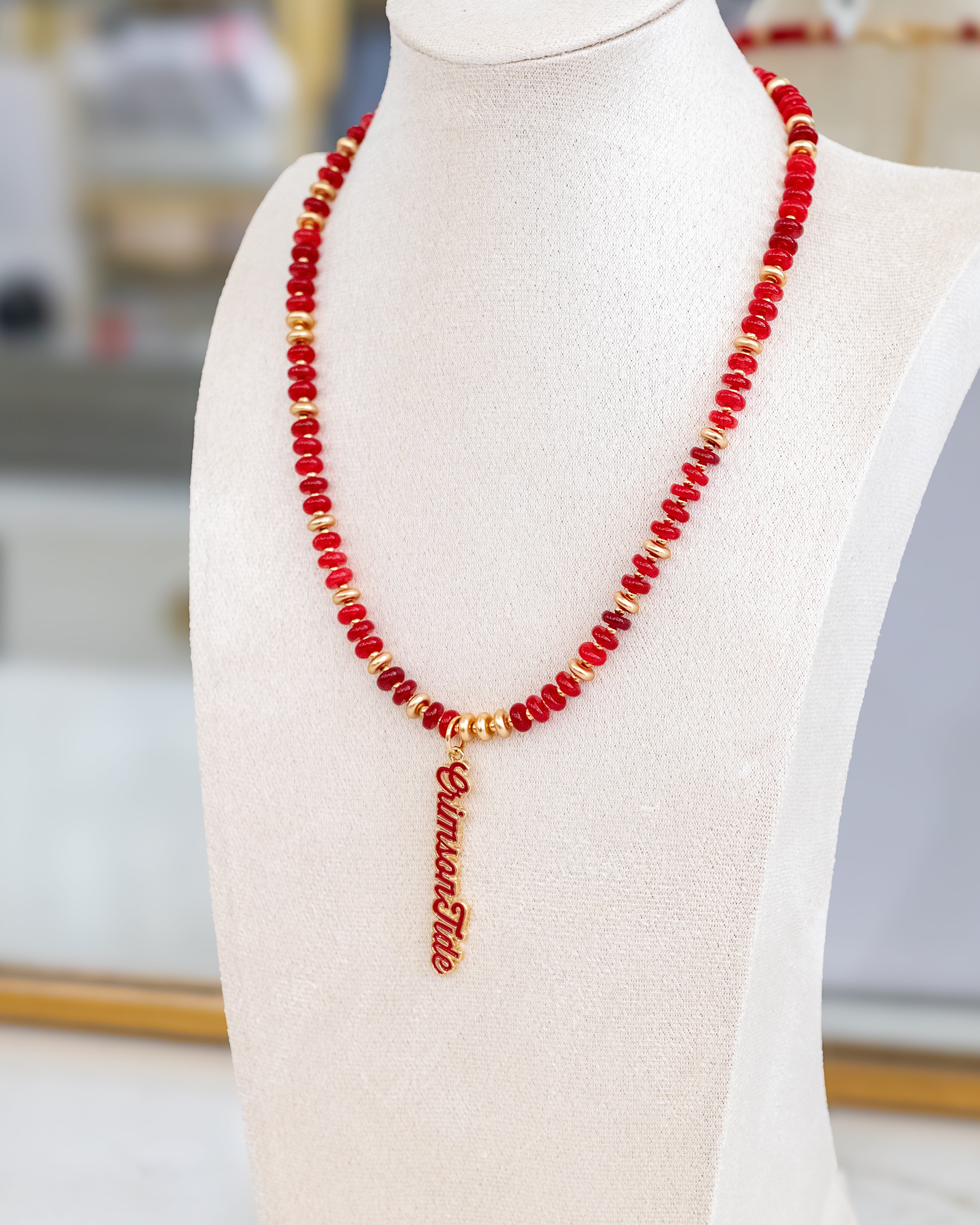 Red and gold beaded necklace with Alabama Crimson Tide pendant