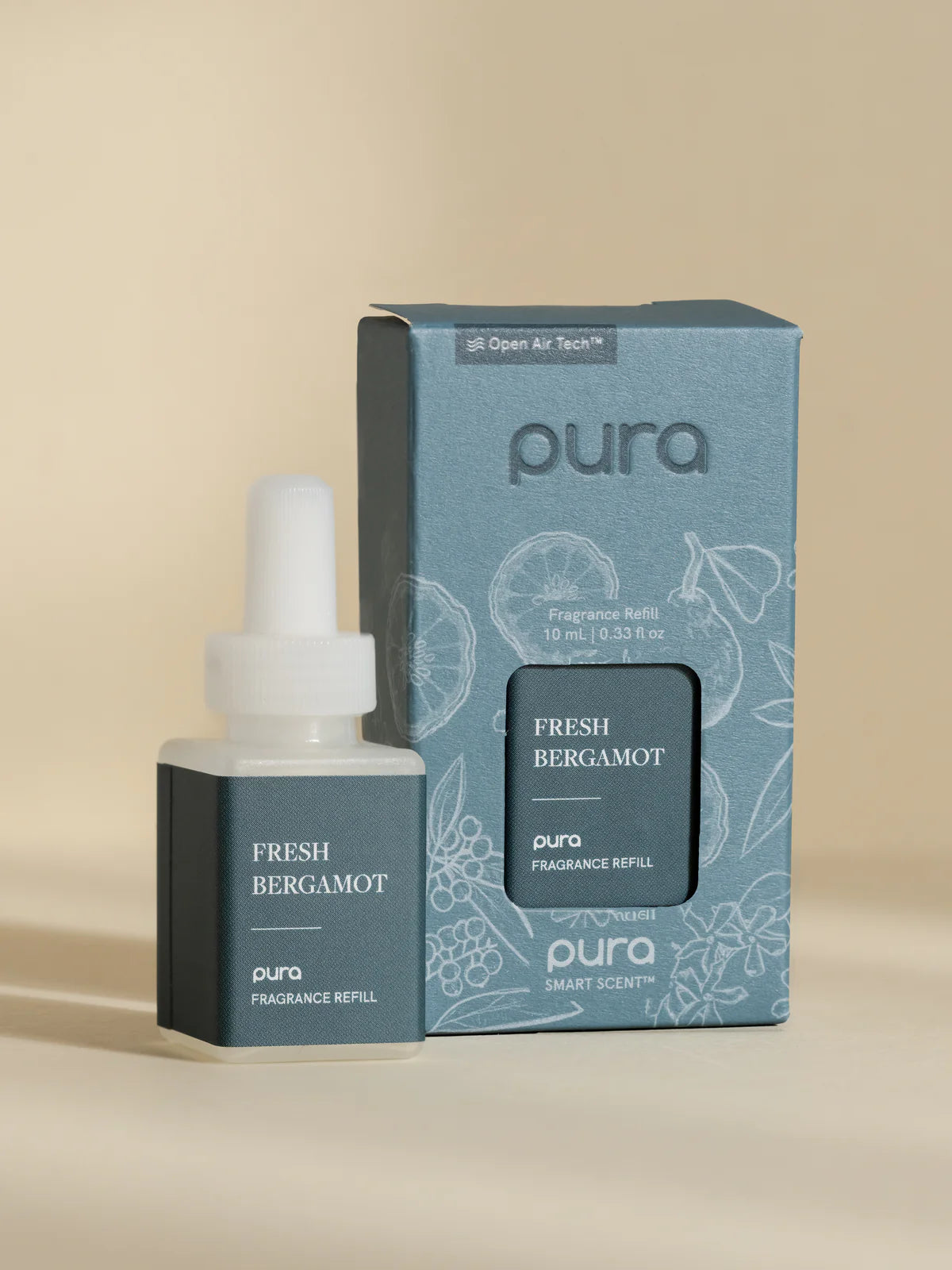 Pura Fresh Bergamot fragrance refill bottle and packaging on a beige background
