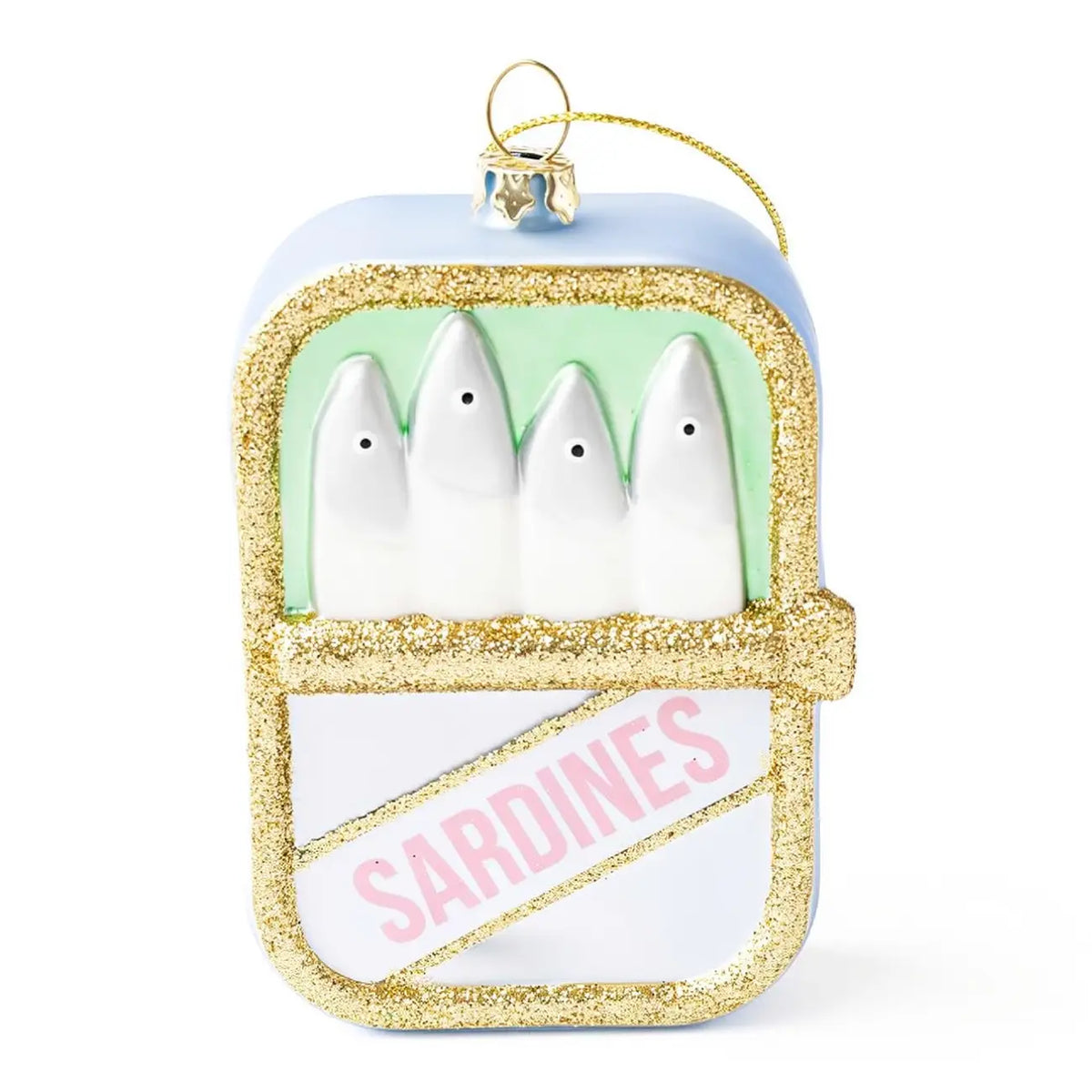 A sardine-shaped Christmas ornament featuring four white sardine bodies under a light blue lid, with glittery gold trim, a pale green interior, and a white lower section with pink 'SARDINES' text. A gold hanging loop is attached at the top.