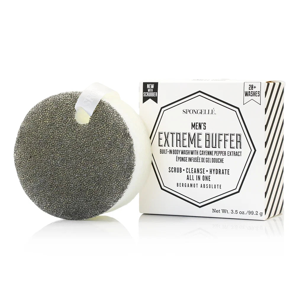 A round sponge body wash with a gray scrubbed exterior and white core, shown next to its white packaging box labeled 'Spongullé Men's Extreme Buffer' on a clean white background.