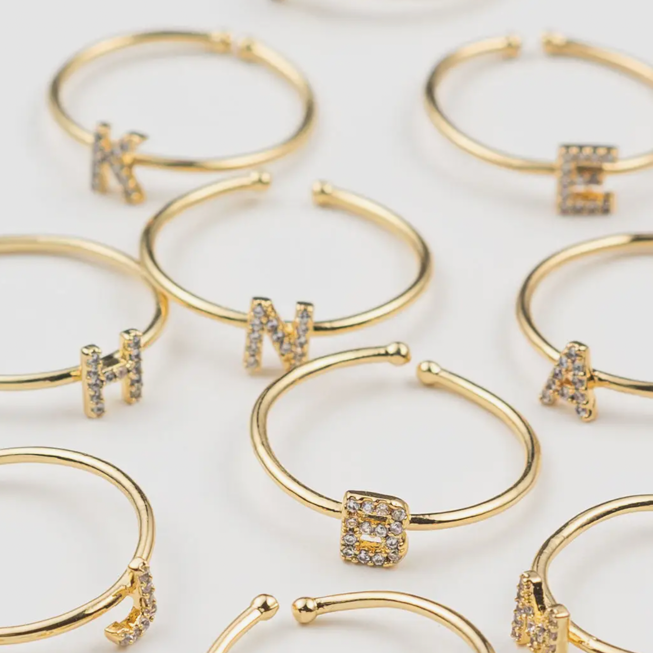 Dainty Initial Rings