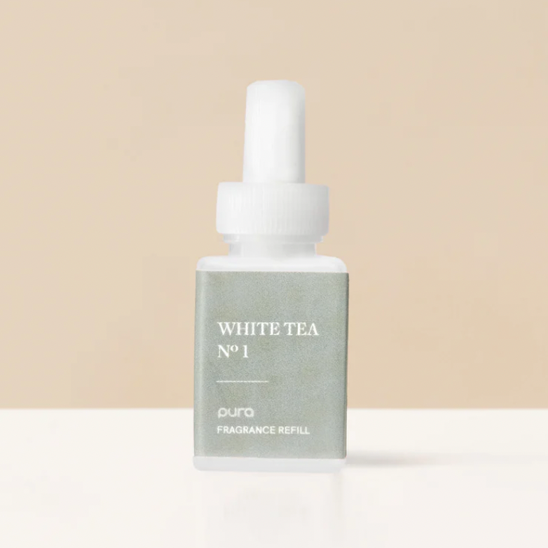 White tea fragrance refill bottle on a beige background