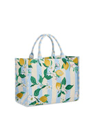 Tote bag with lemon and floral pattern on a white background