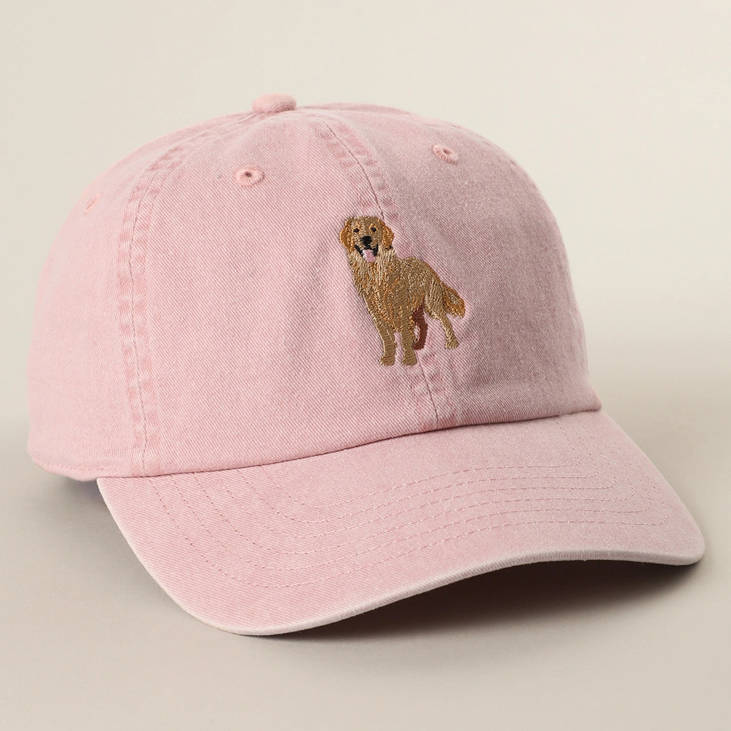 Pink cap with a dog illustration on a beige background