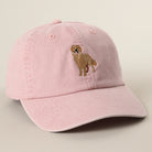 Pink cap with a dog illustration on a beige background
