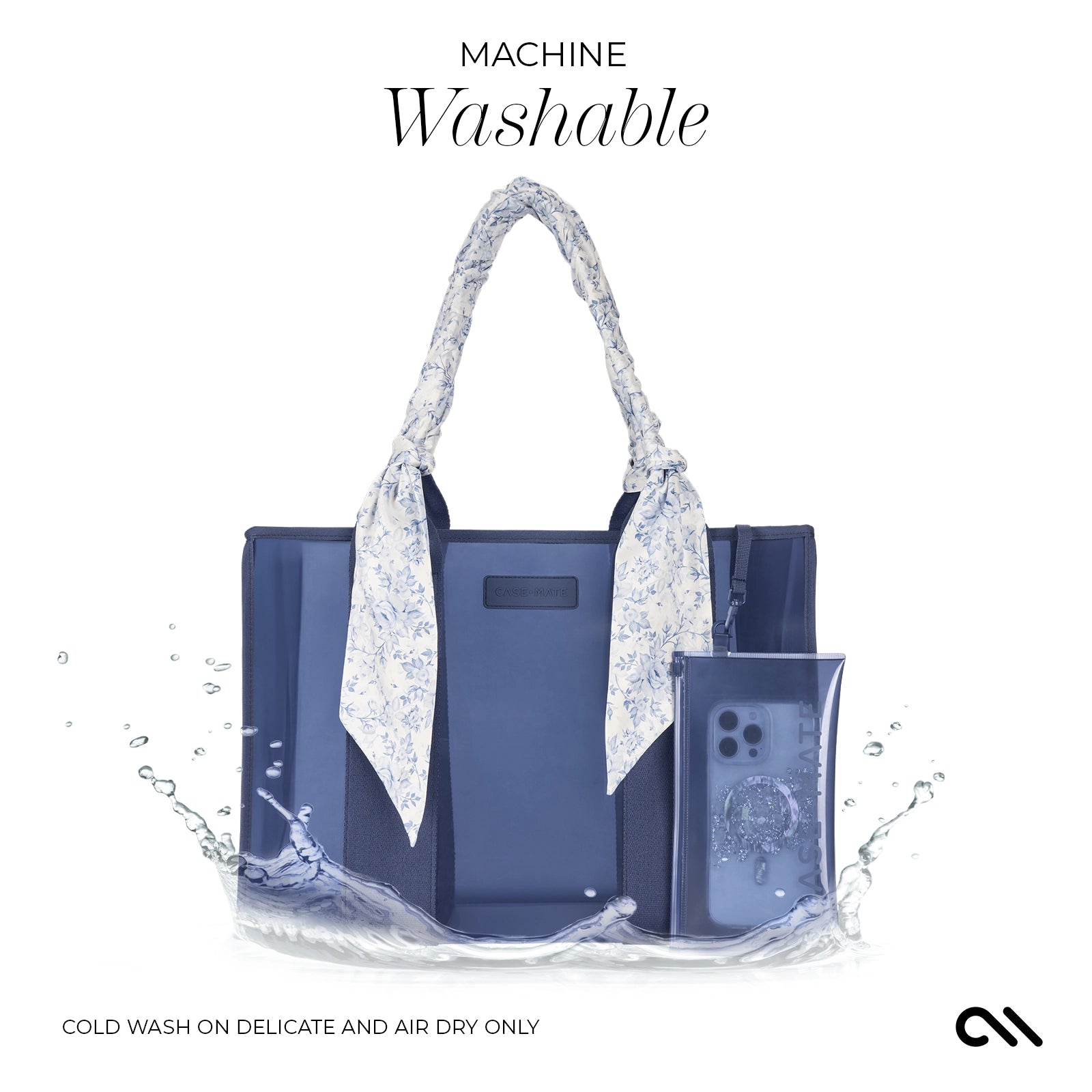 Blue handbag with floral accents and a phone case, labeled 'Machine Washable' on a white background.