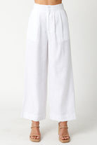 White wide-leg pants on a white background