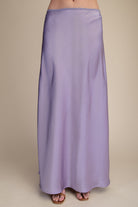 Lavender maxi skirt on a beige background