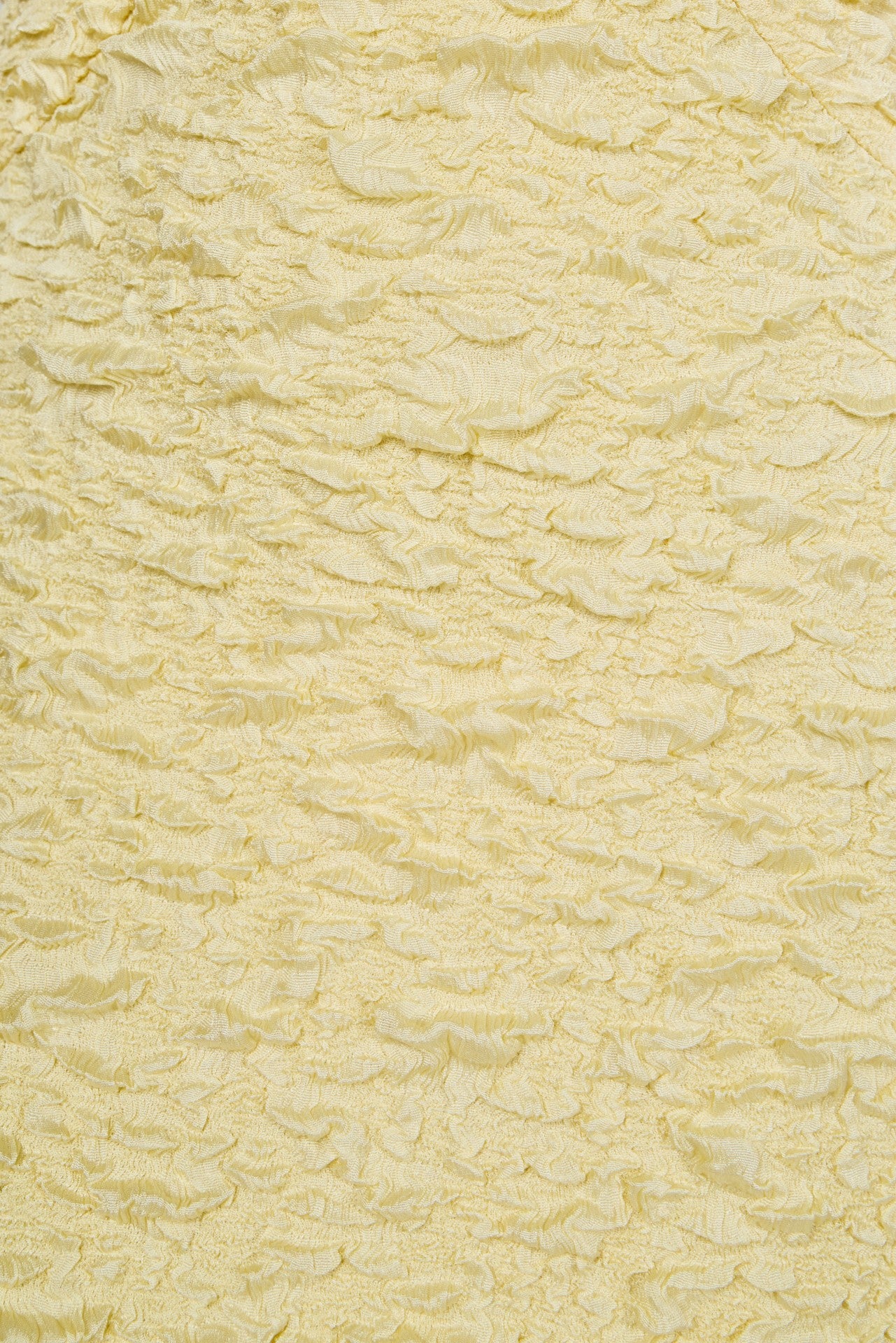 Close-up of a textured beige paper surface
