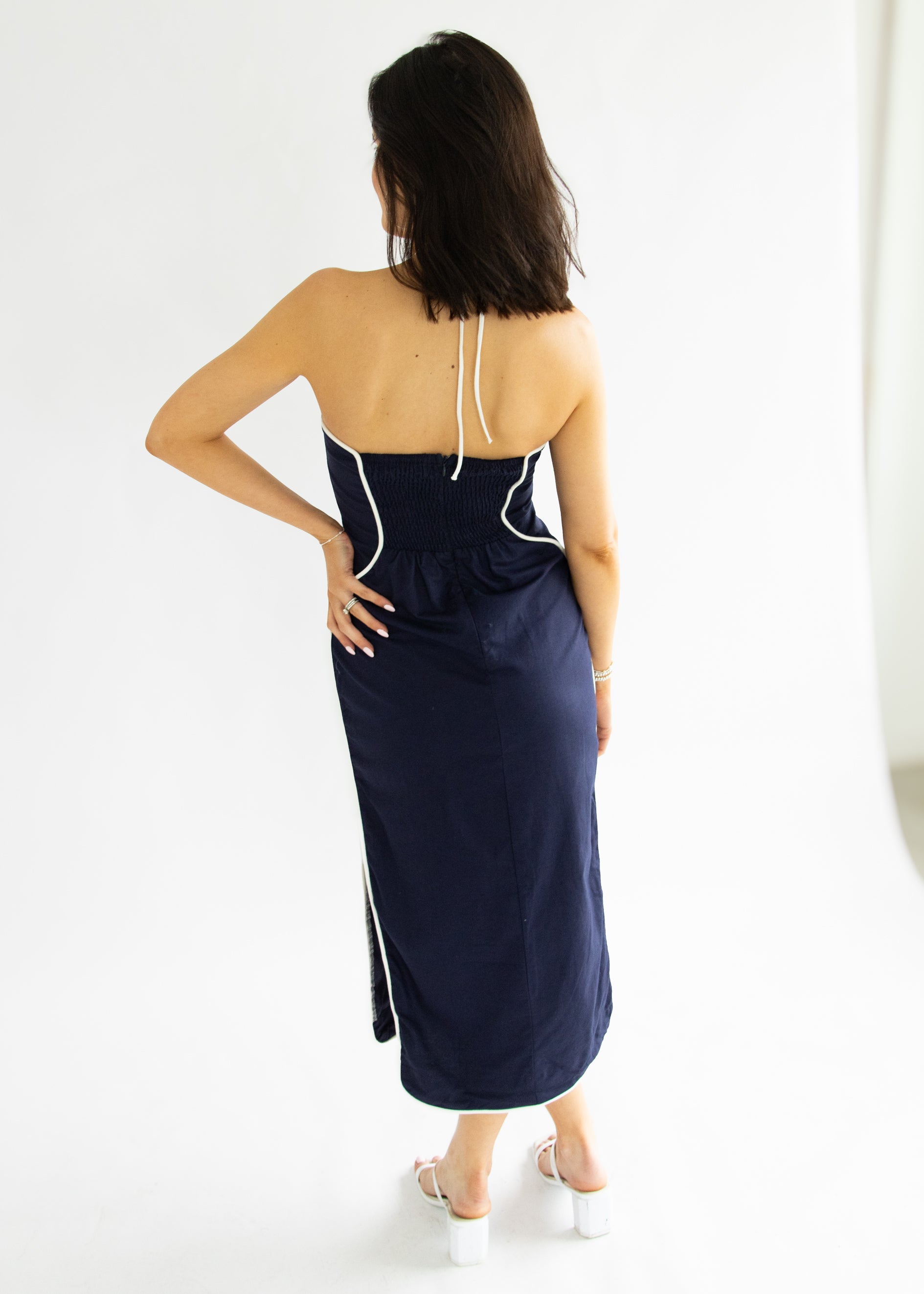 woman wearing navy dress