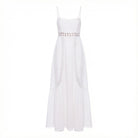 White dress with thin straps on a white background