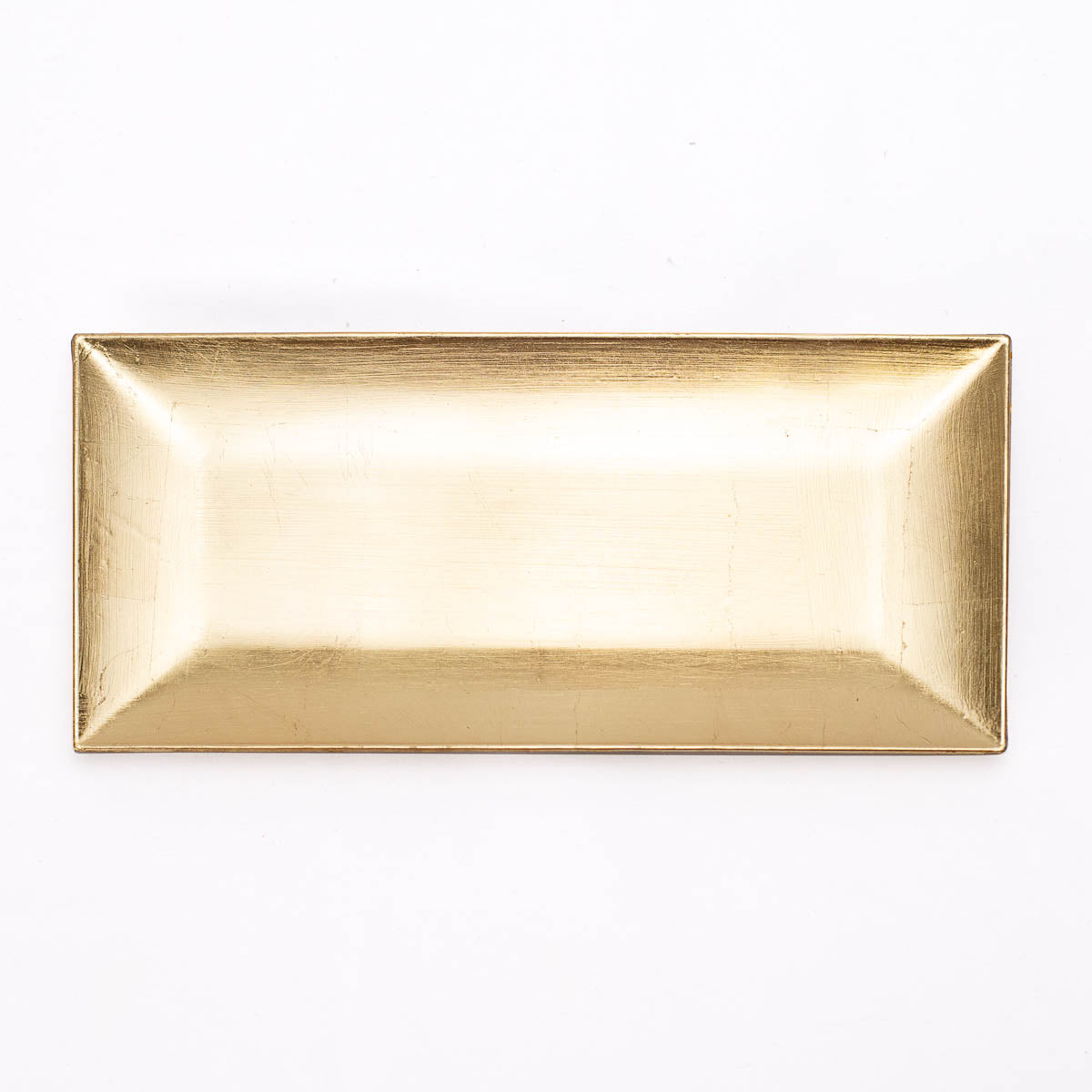A rectangular gold tray with a brushed metallic finish, photographed from directly above on a clean white background.