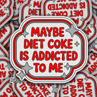 Sticker with 'Maybe Diet Coke is Addicted to Me' text on a patterned background