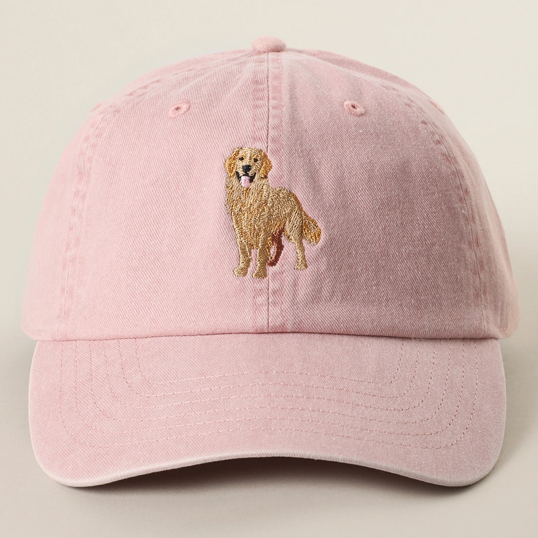 Pink cap with a dog illustration on a beige background