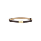 A slim dark brown leather belt with a gold-tone turn-lock clasp and a beige interior lining, displayed horizontally on a solid white background.