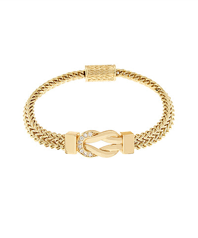 Gold bracelet with a half CZ clasp on a white background