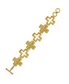 Gold bracelet with cross designs on a white background