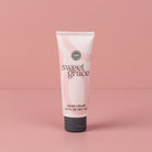 Tube of sweet grace hand cream on a pink background