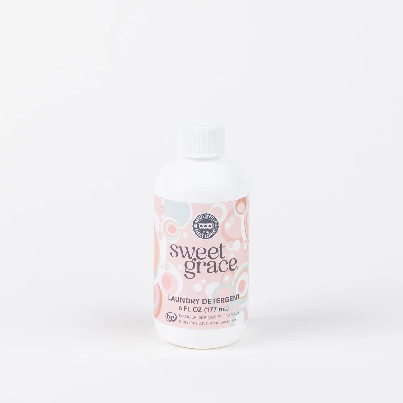 Bottle of Sweet Grace laundry detergent on a white background