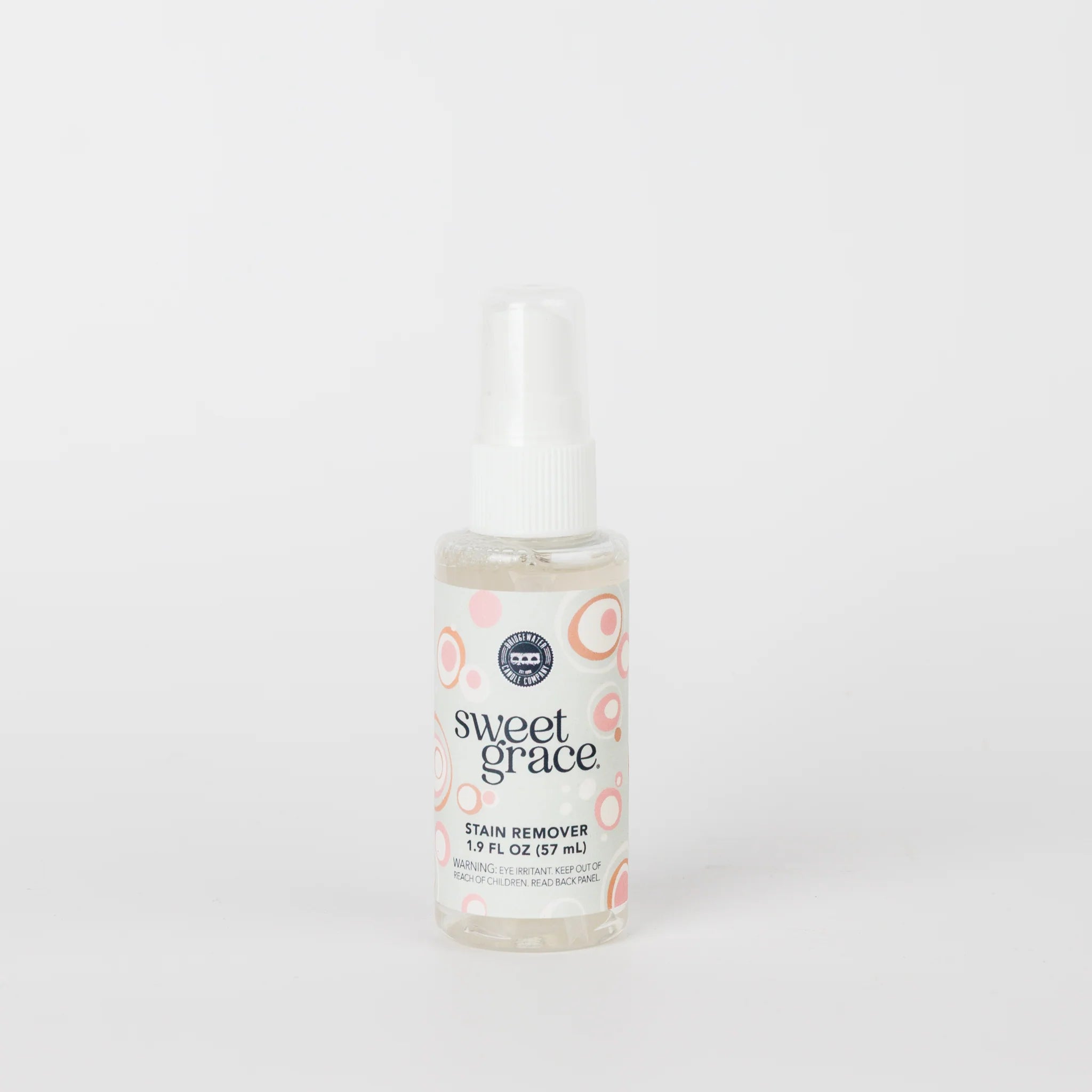 Bottle of sweet grace stain remover on a white background