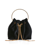 A black velvet bucket bag with a gold-tone circular metal handle, gold drawstring closure, and a gold chain detail, shown on a clean white background.