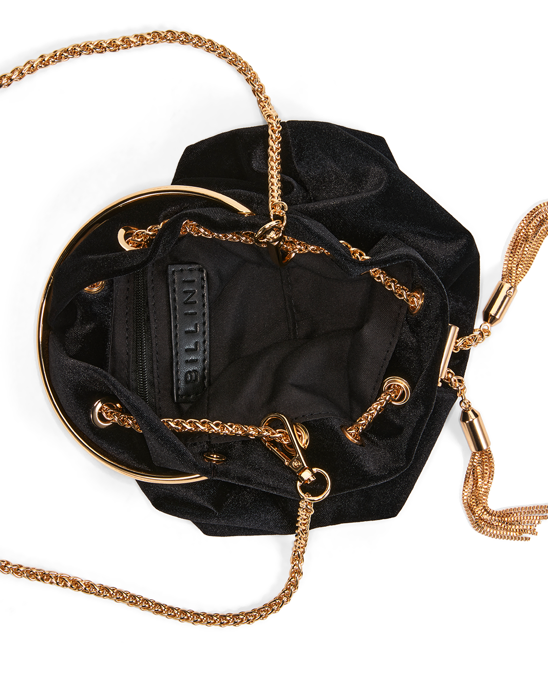 Black velvet bucket bag with gold-tone chain strap, circular metal frame, and tassel detail, shown from a top-down view on a white background. The brand name 'INITIATE' is visible on the interior label.