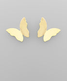 Gold butterfly-shaped earrings on a gray background