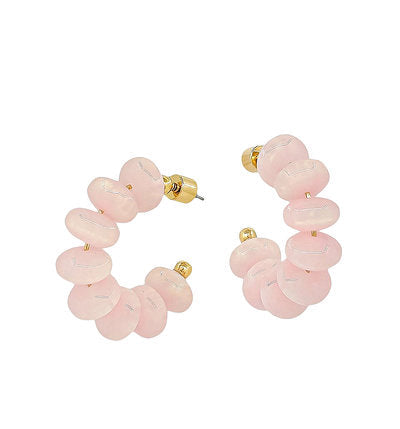 Pair of pink candy beaded hoop earrings with gold accents on a white background