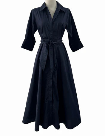 Black dress on a mannequin against a white background