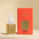 Glasshouse Fragrances bottle and packaging on a beige background