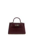 A structured top-handle handbag in deep burgundy epi leather with gold-tone hardware, shown against a plain white background.
