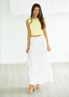 woman wearing yellow tank