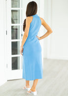 woman wearing long blue dress