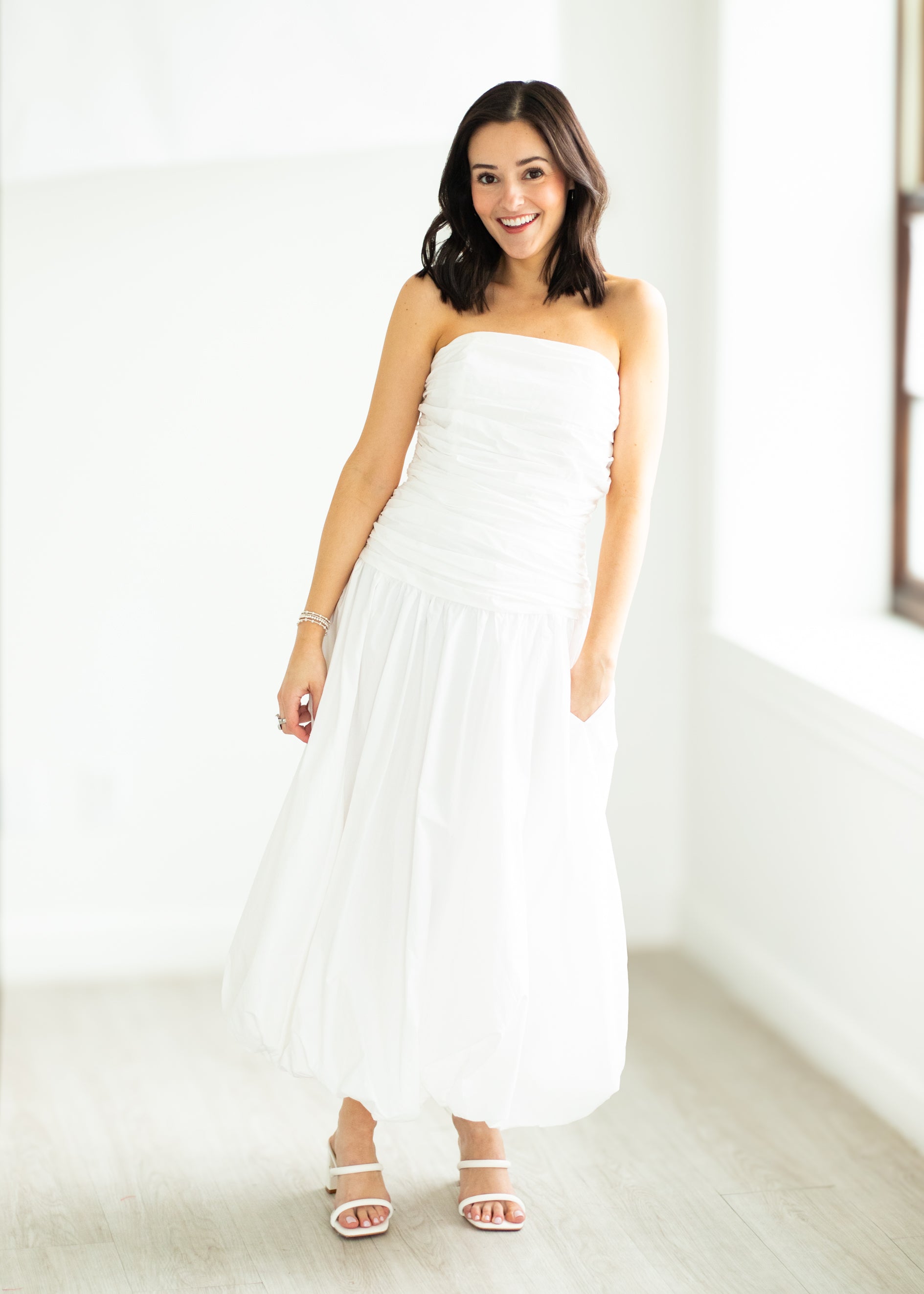 woman wearing white dress