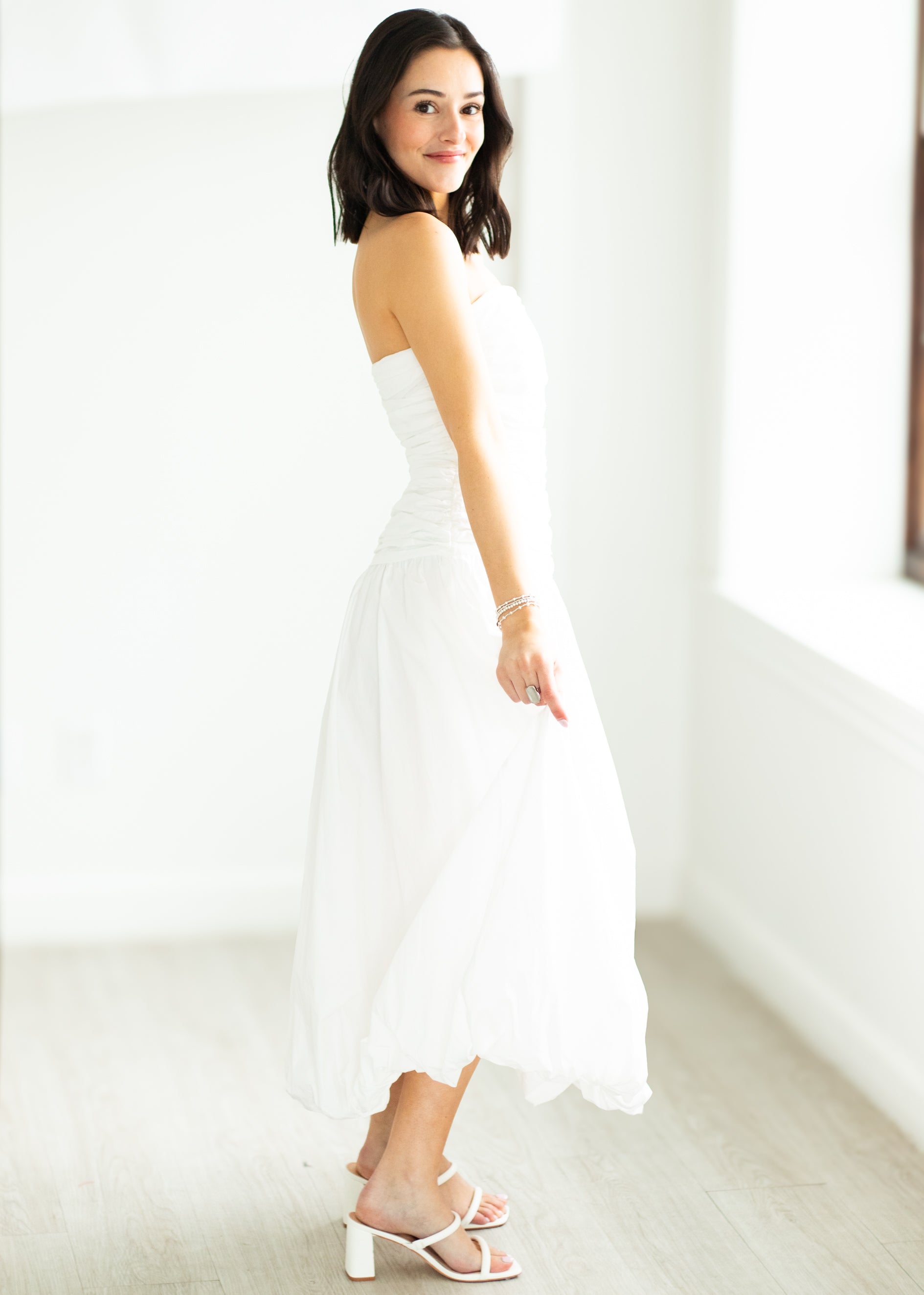 woman wearing white dress