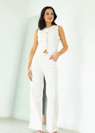 woman wearing white denim outfit