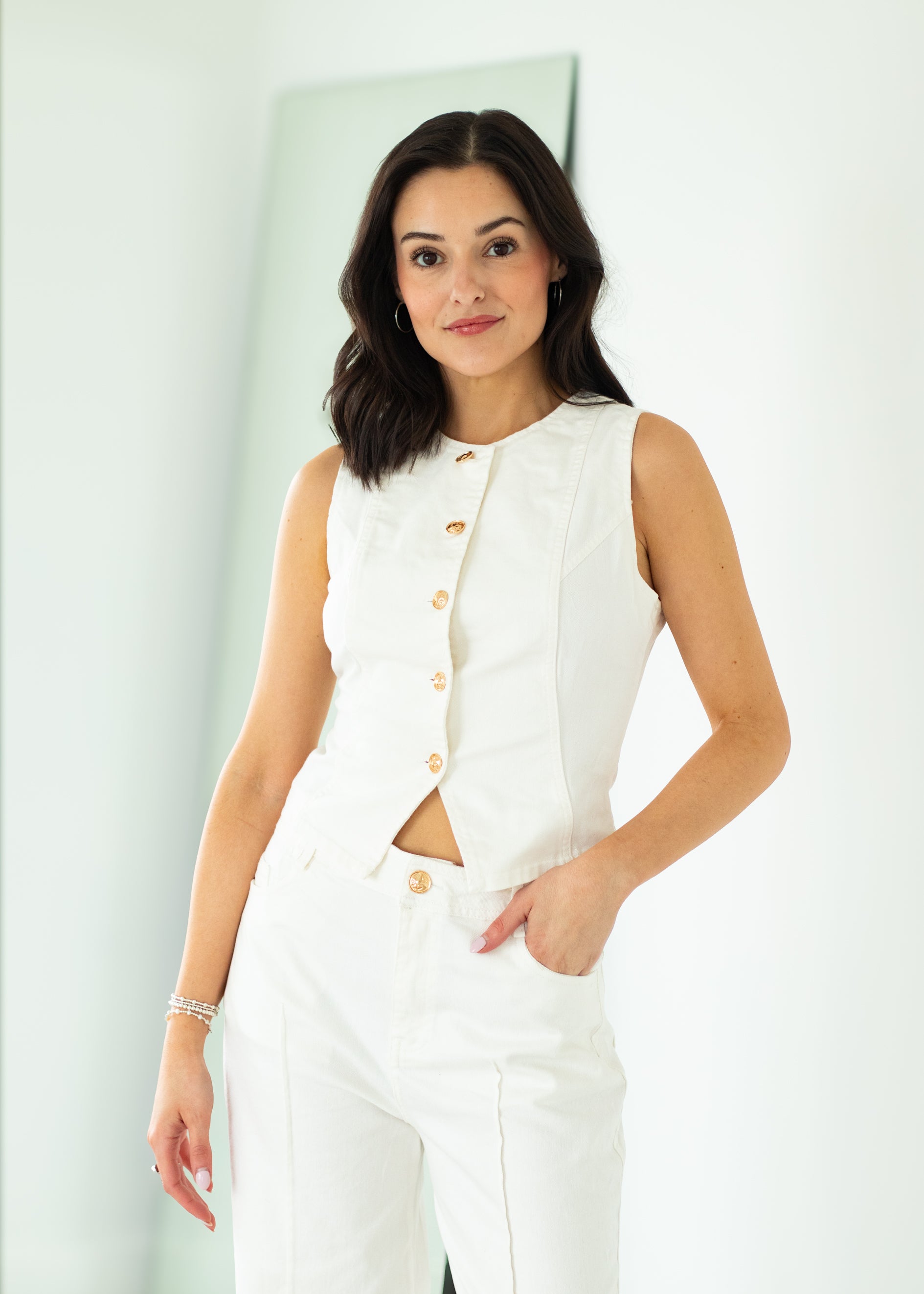 woman wearing white denim outfit