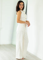 woman wearing white denim outfit