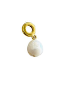 A single jewelry charm featuring a textured gold ring at the top and a dangling baroque-style white pearl, shown on a light speckled gray background.