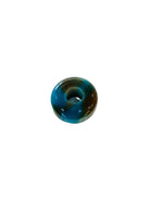 Multicolored gemstone ring on a white background