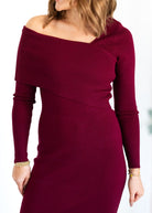 Maroon off-shoulder dress worn by a person on a white background