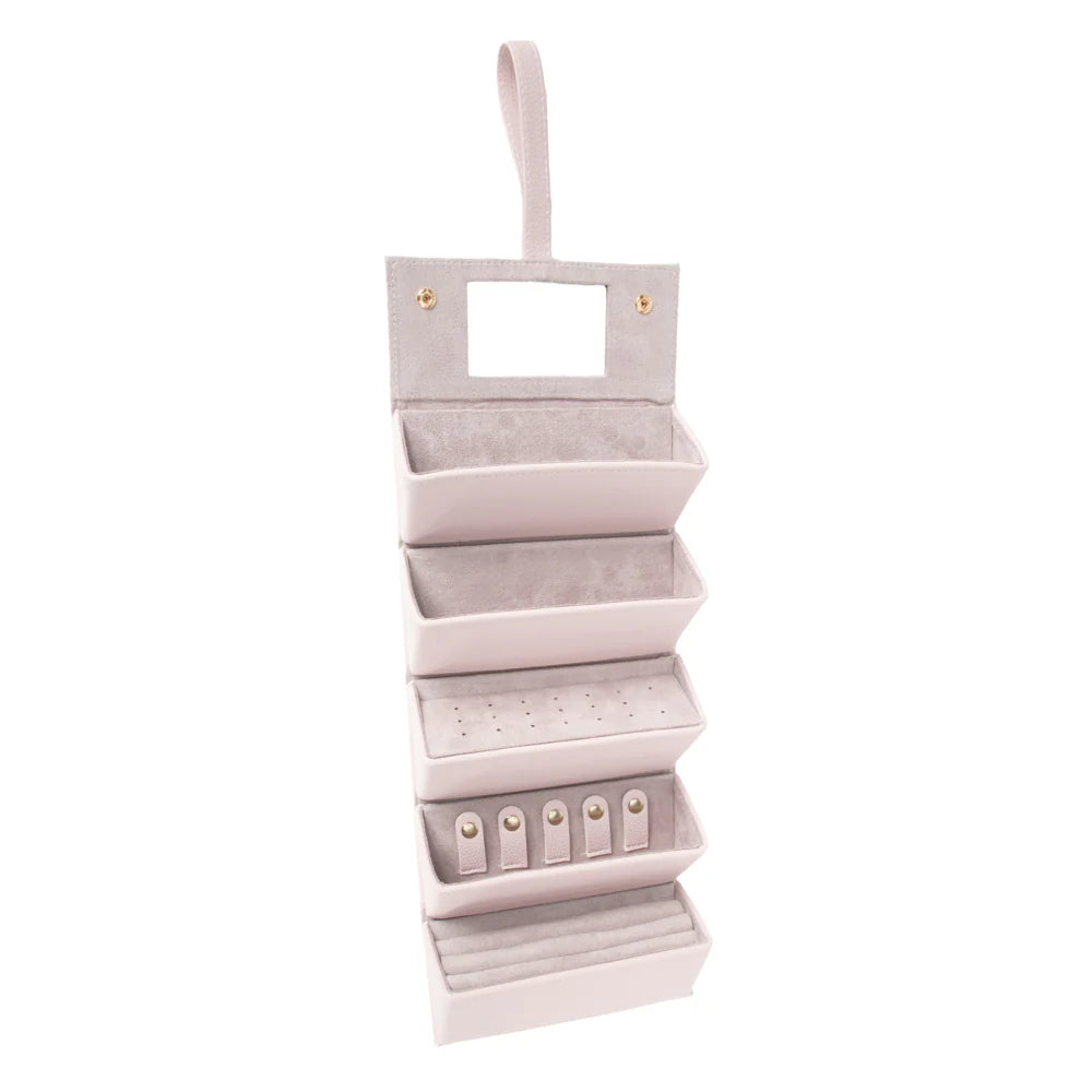 pale pink eyewear and jewelry organizer with multiple compartments on a white background